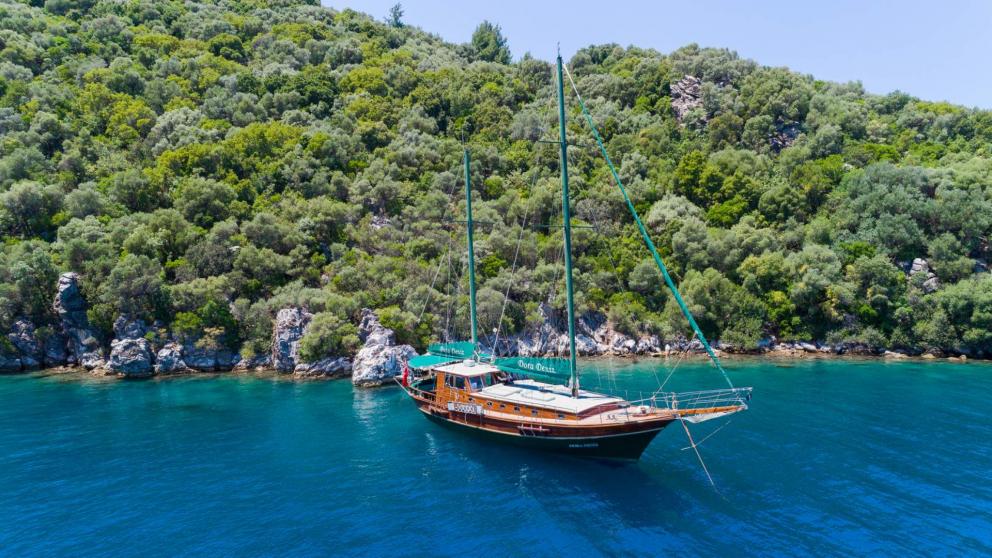 Luxurious gulet Dora Deniz at sea with lowered sails